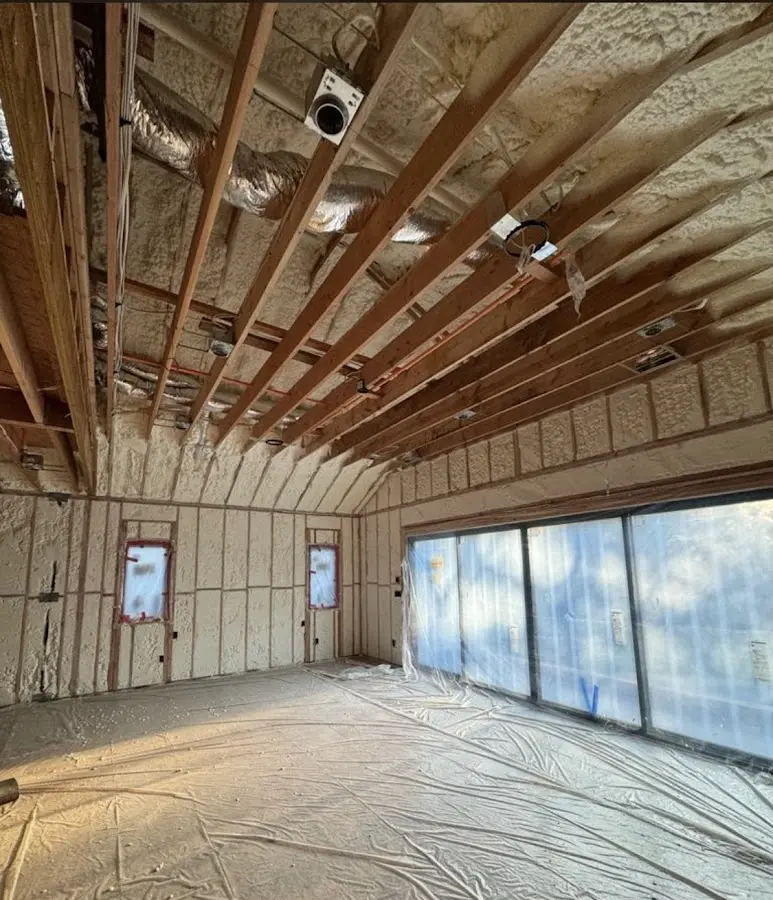Interior walls and ceiling insulated with spray foam during new construction in Forks